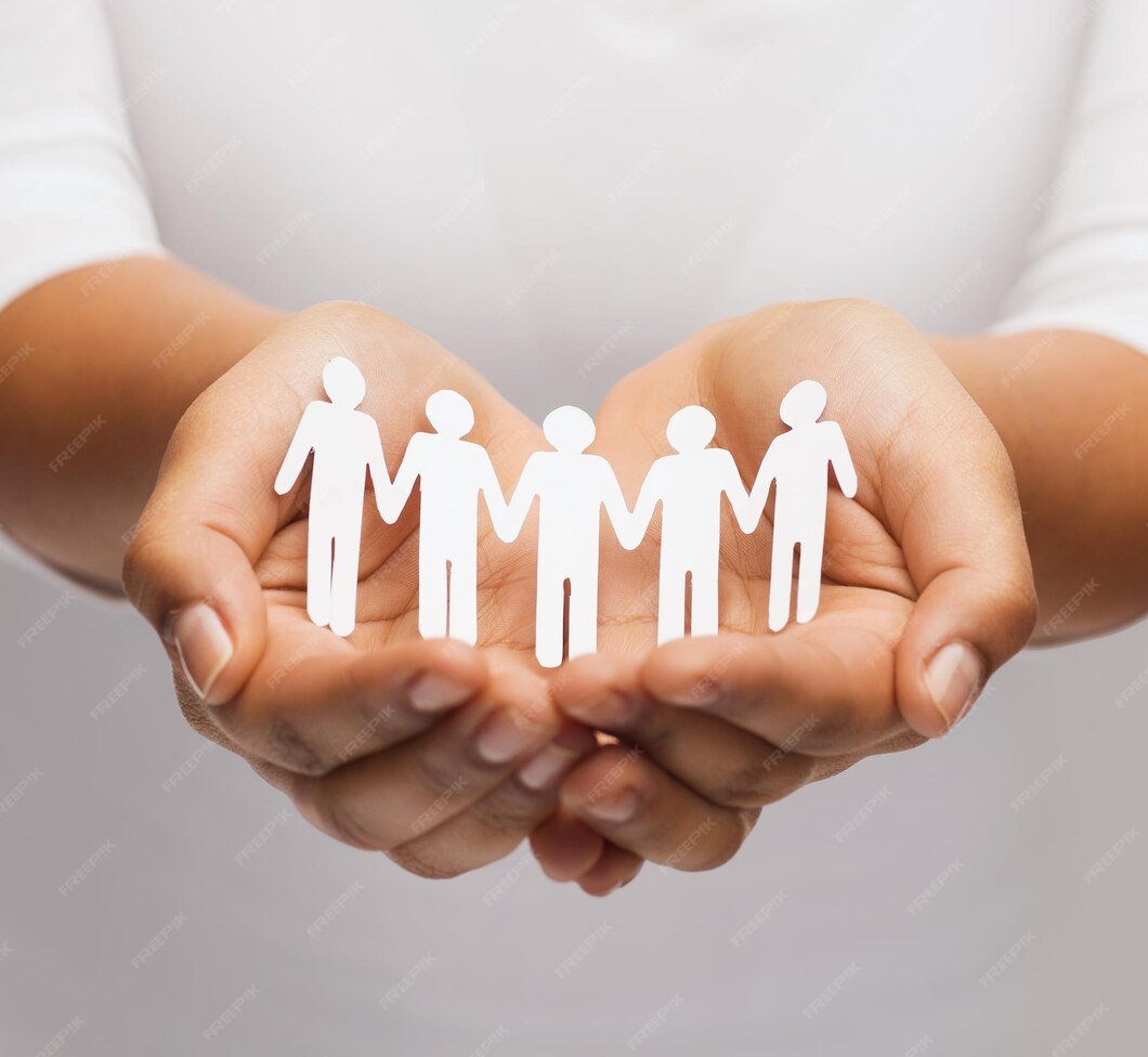 relationships-love-concept-womans-hands-showing-paper-cutout-team_380164-50379